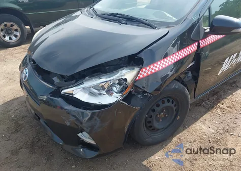 2014 Toyota Prius C Two from USA, damaged, VIN JTDKDTB31E1067603